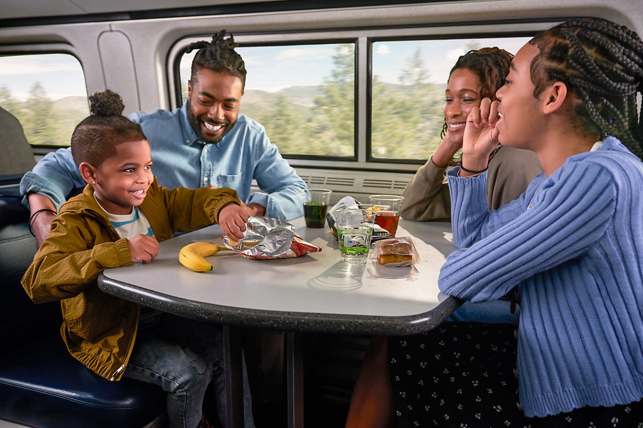 Family at Table in Coach